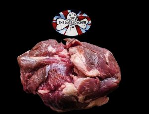Dogs butcher meaty ox chunks image
